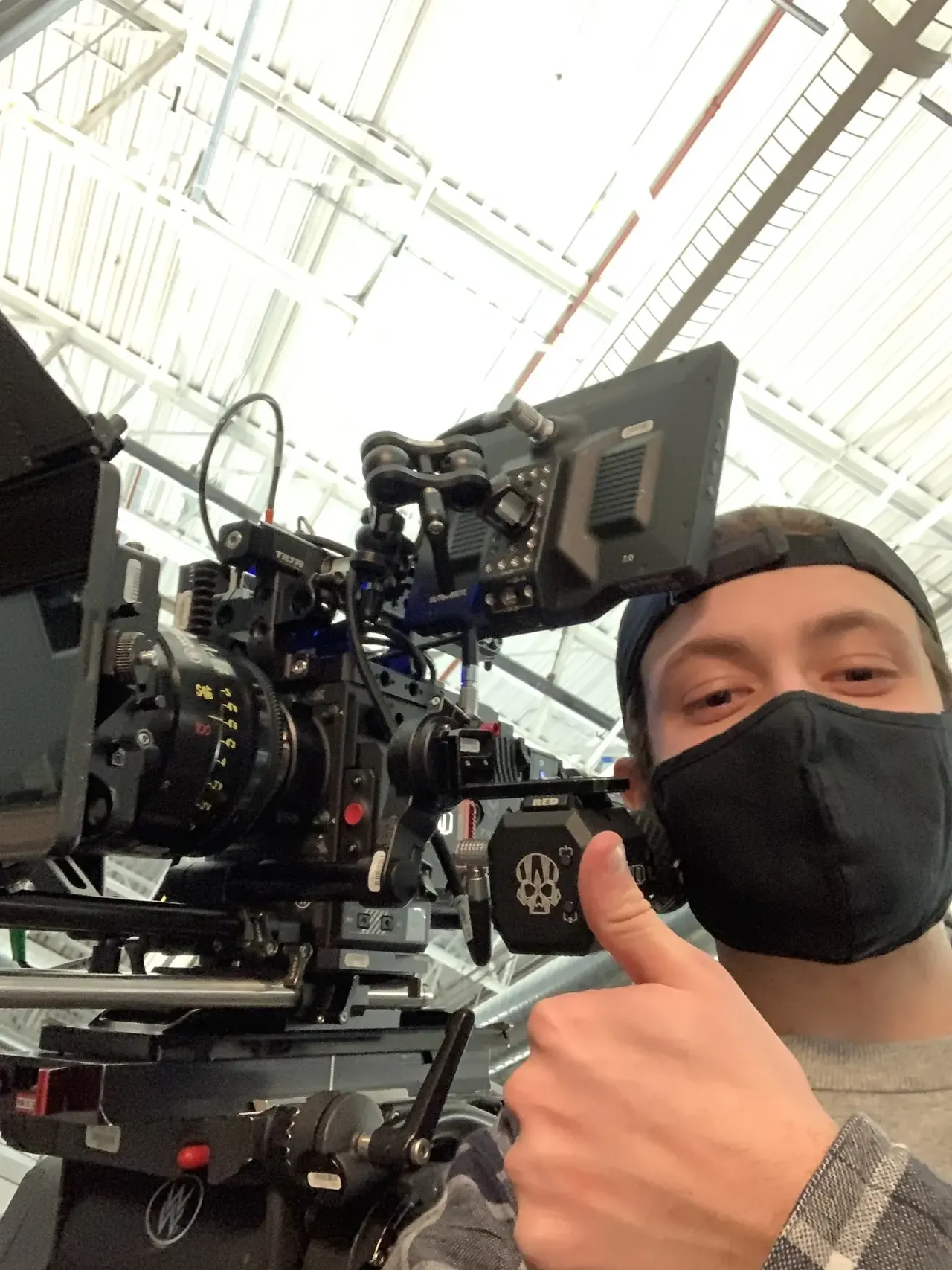 Braeden beside a RED cinema camera