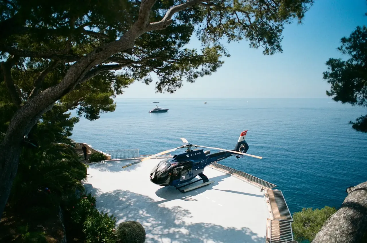Helicopter arriving on a coastal landing area